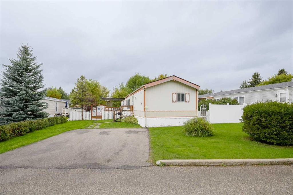 107 Heritage Drive, Okotoks, MLS® # A2345707