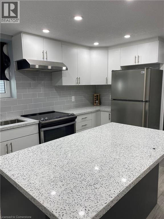 MLS® listing #28731791 for sale located at 458 VILLAGE Crescent Unit# LOWER