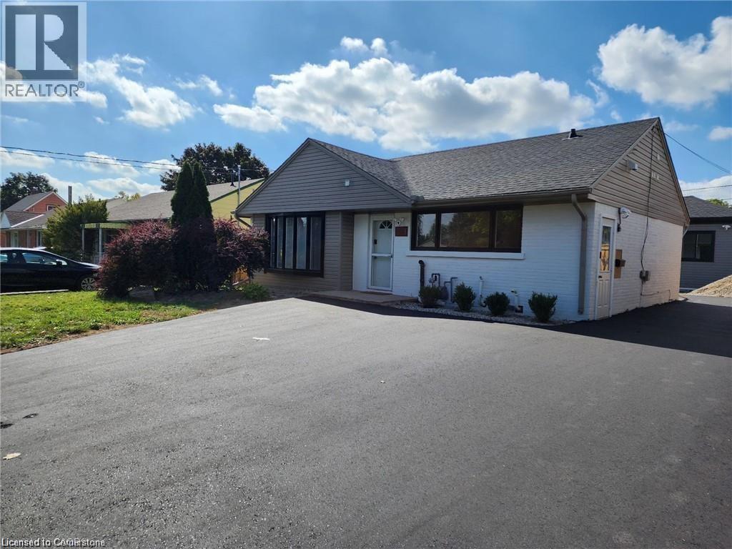 MLS® listing #29076483 for sale located at 261 BELMONT Avenue W Unit# LOWER