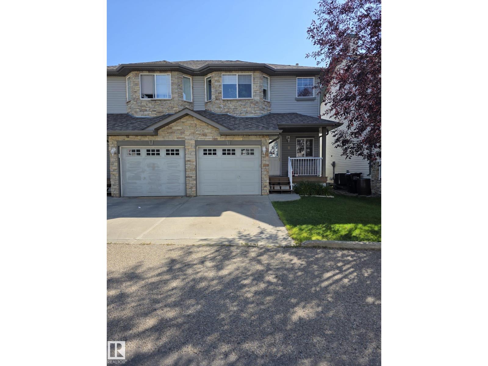 MLS® listing #29084601 for sale located at #11 6304 SANDIN WY NW