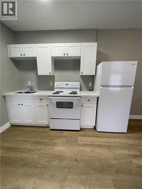 MLS® listing #29200592 for sale located at 163 QUEEN Street Unit# 1