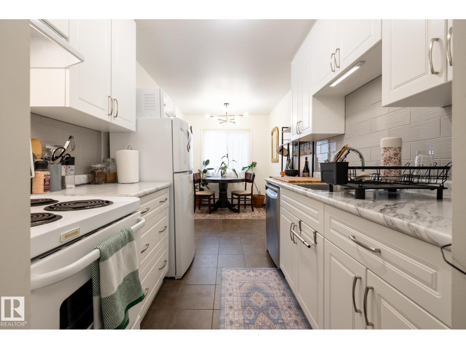 MLS® listing #29311236 for sale located at #307 5730 RIVERBEND RD NW