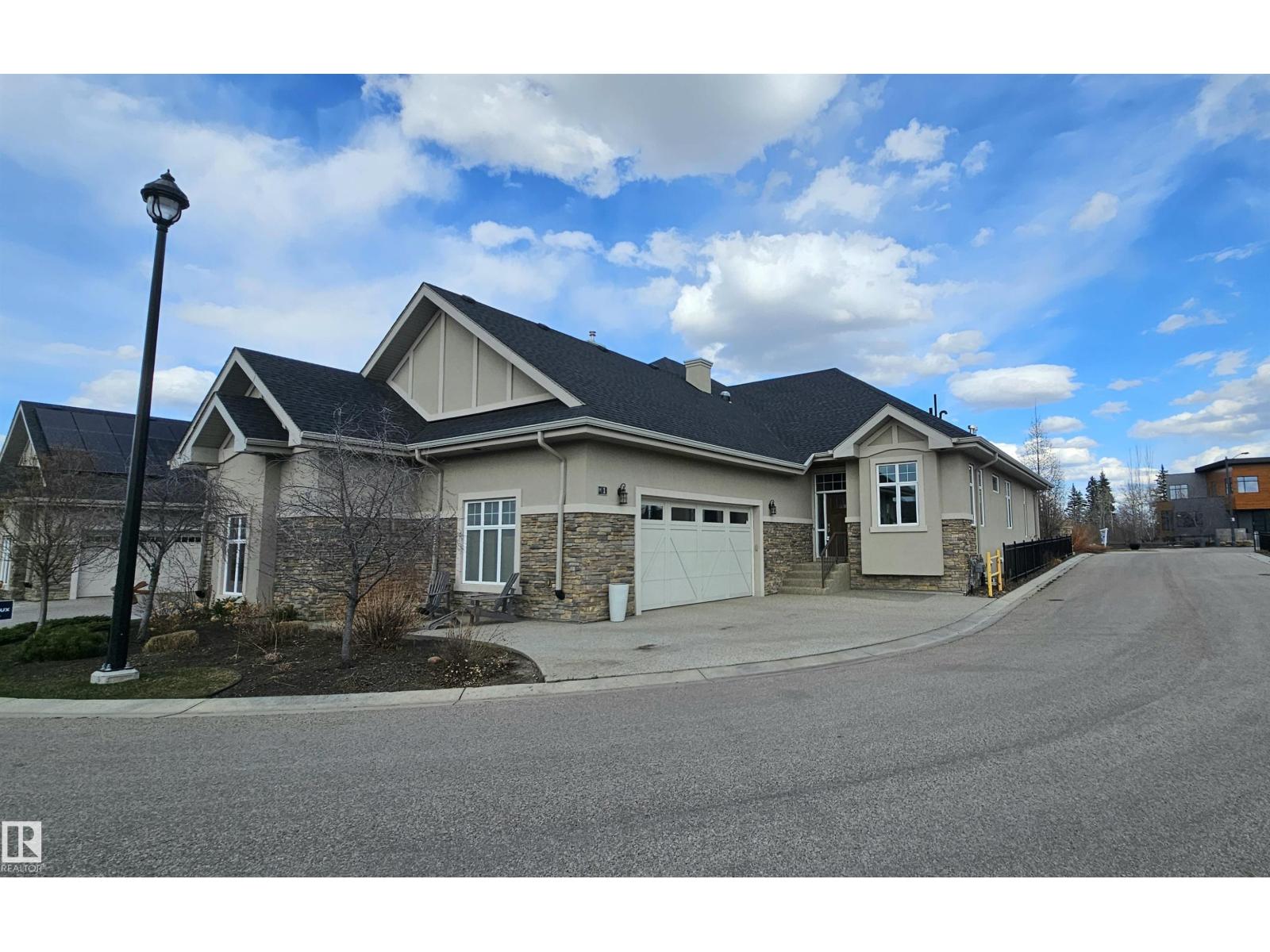 MLS® listing #29320463 for sale located at #1 7570 MAY CM NW