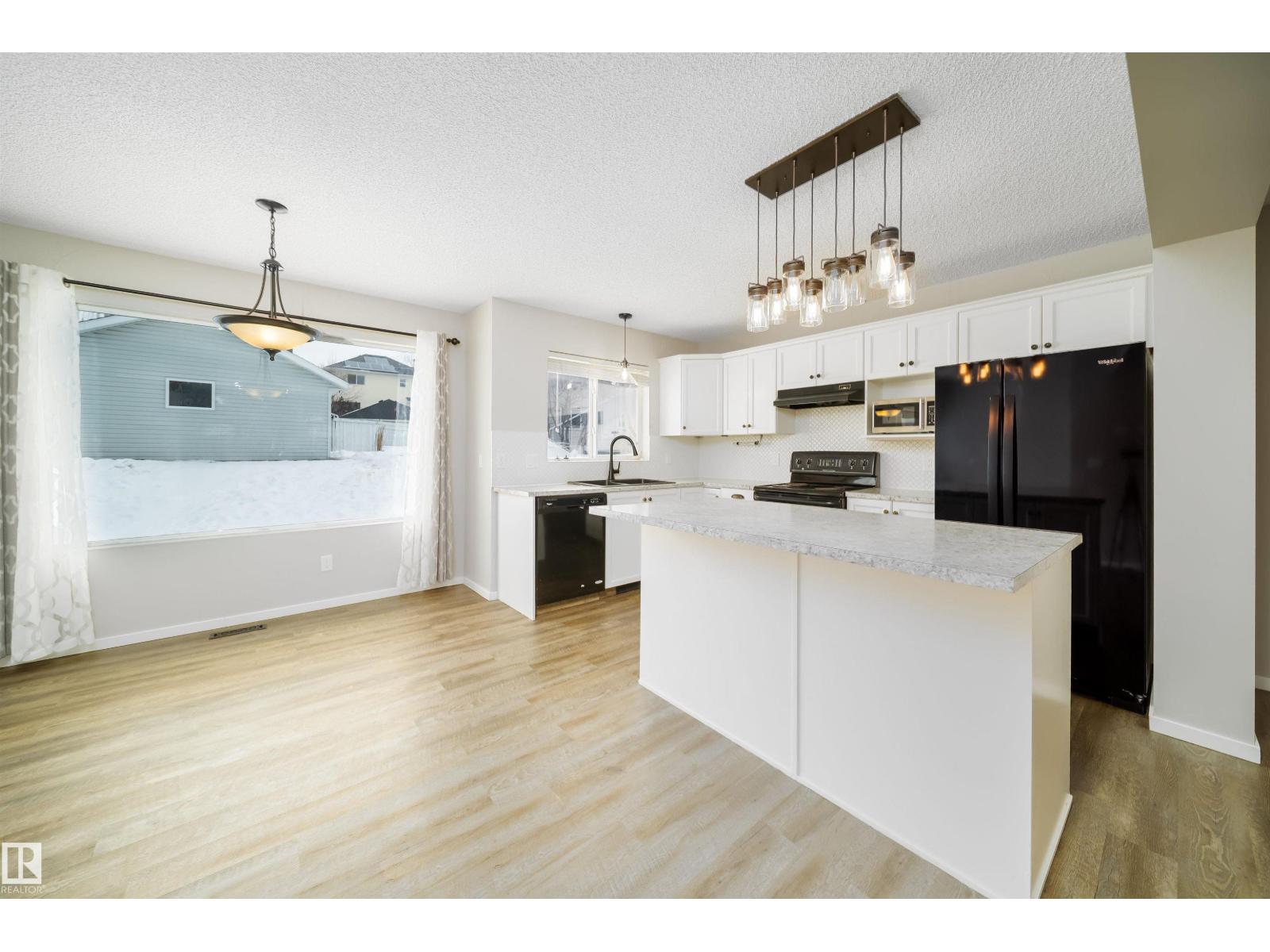 MLS® listing #29325621 for sale located at 1695 TOMPKINS PL NW