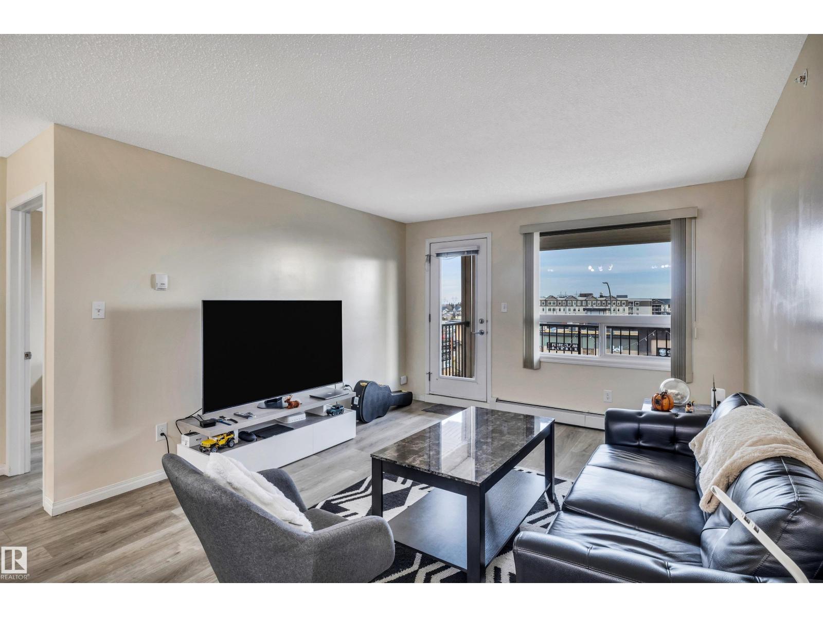 MLS® listing #29361969 for sale located at #2405 7343 SOUTH TERWILLEGAR DR NW