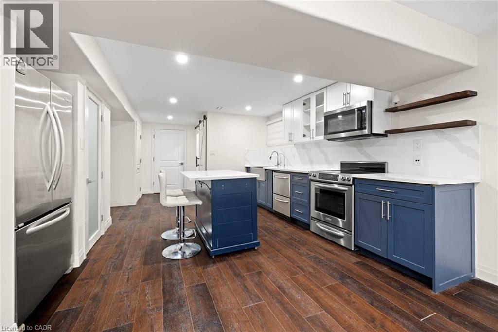 MLS® listing #29490381 for sale located at 695 ROBERT FERRIE Drive Unit# LOWER