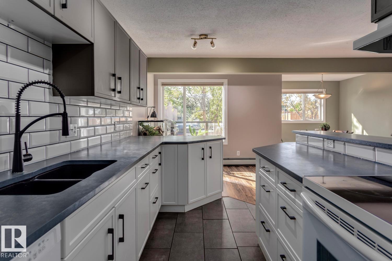 MLS® listing #29520112 for sale located at #209 11033 127 ST NW