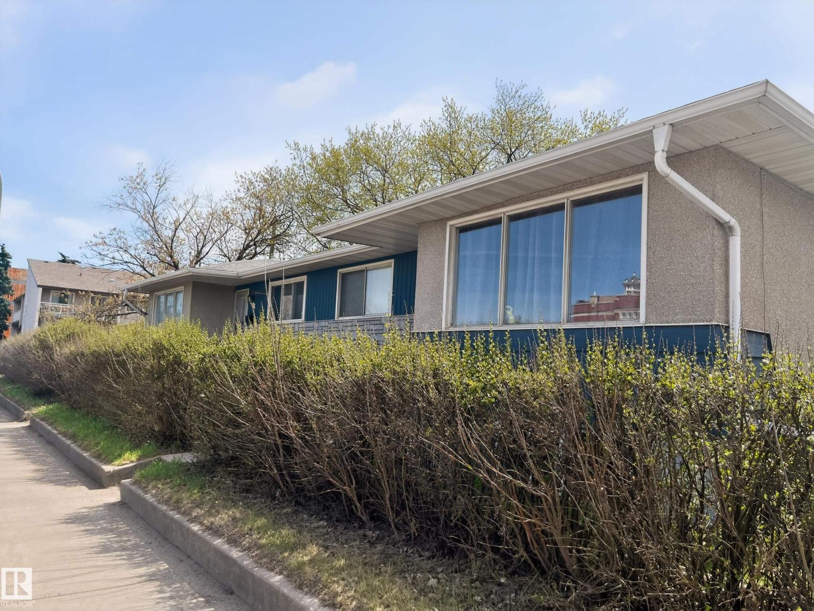 MLS® listing #29763573 for sale located at 13007 / 13009 111 AV NW