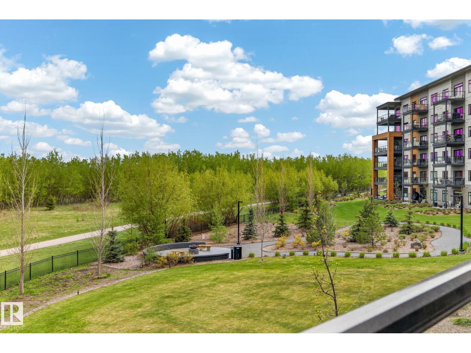 MLS® listing #29779228 for sale located at #207 7463 MAY CM NW