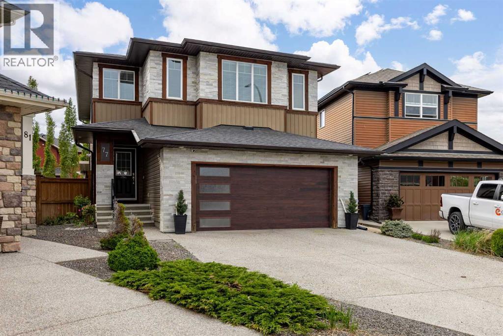 MLS® listing #29838620 for sale located at 77 Cougar Ridge Cove SW