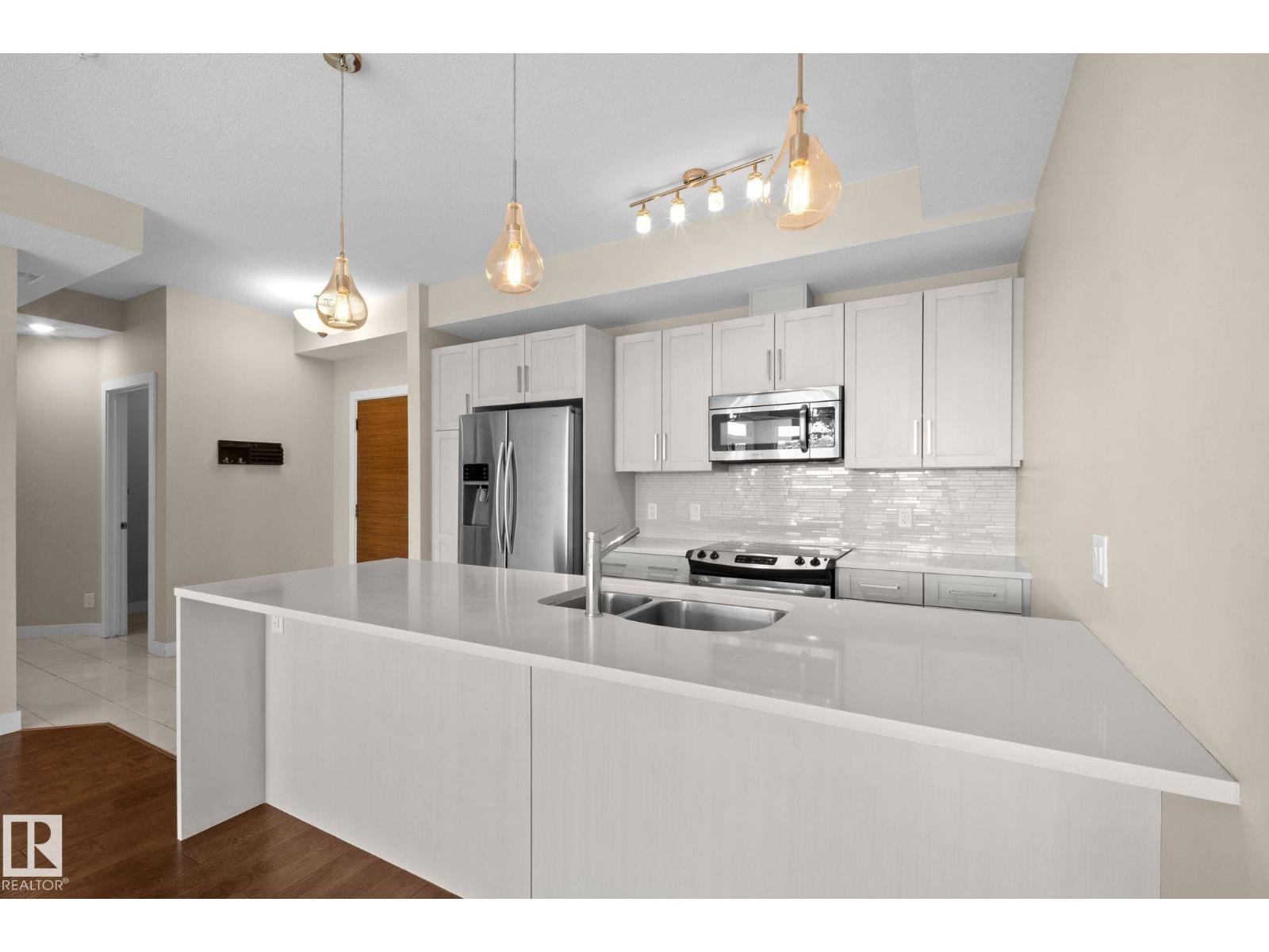 MLS® listing #29840418 for sale located at #309 625 LEGER WY NW