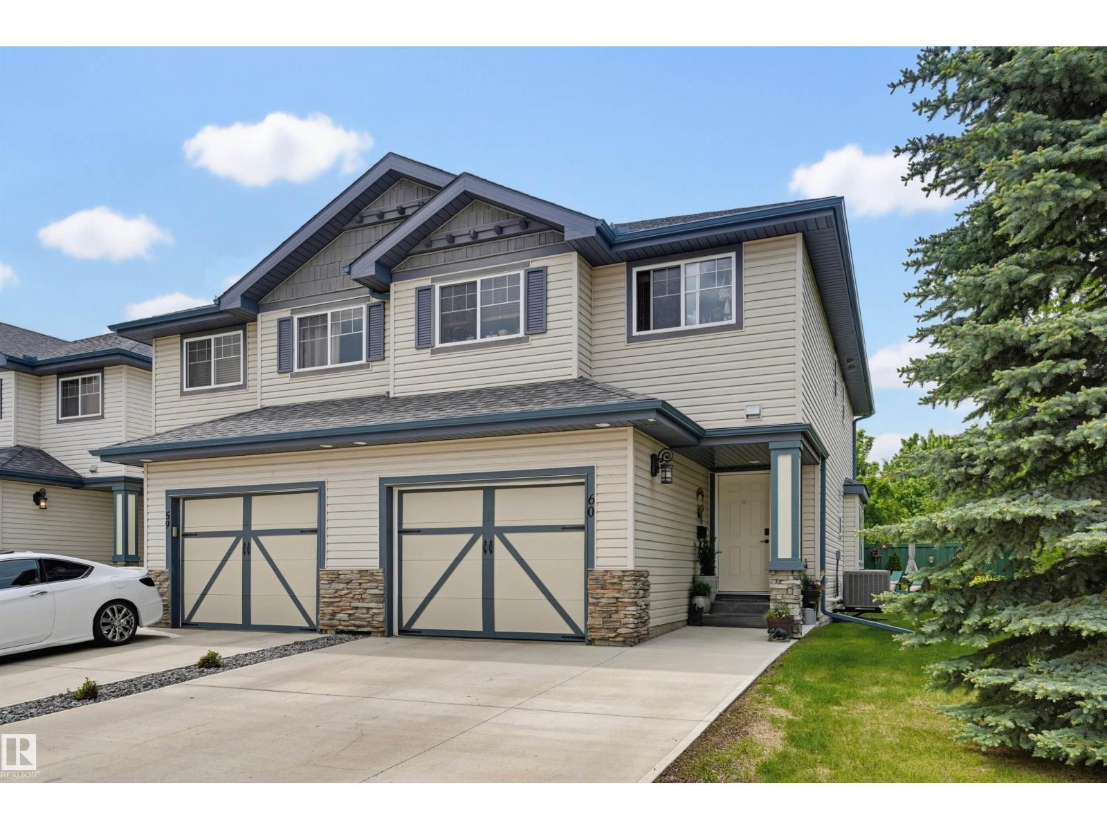 MLS® listing #29896873 for sale located at #60 2565 HANNA CR NW