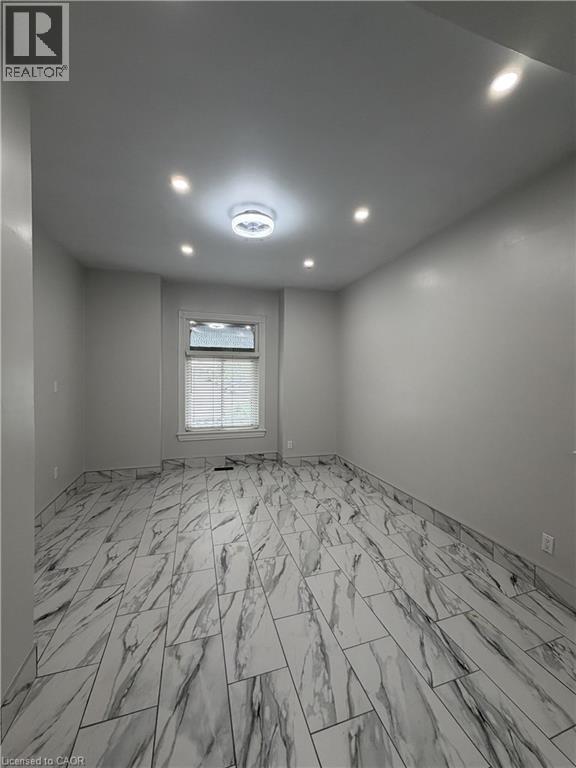 MLS® listing #29922149 for sale located at 169 WENTWORTH Street N Unit# 1