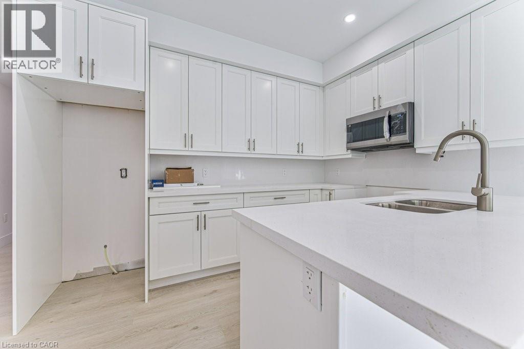 MLS® listing #29985474 for sale located at 66 GAGE Avenue Unit# 1