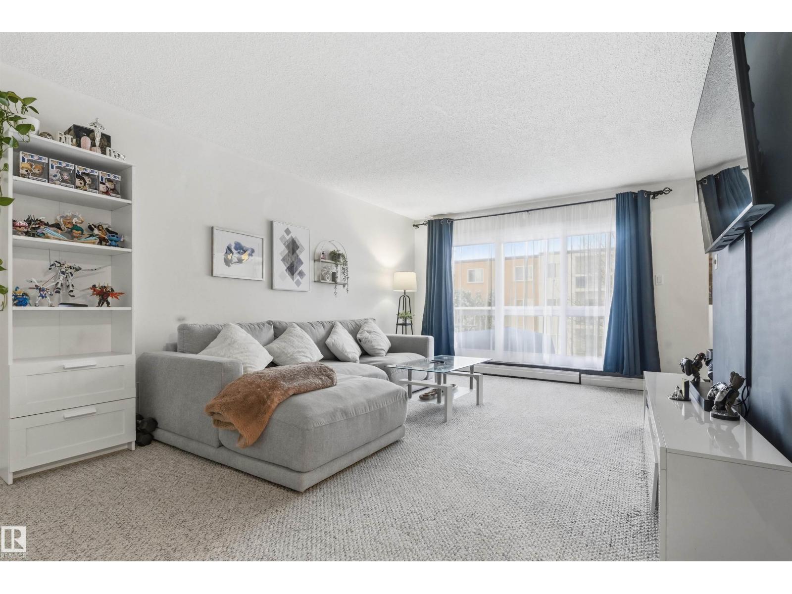 MLS® listing #30040404 for sale located at #205 11440 40 avenue NW