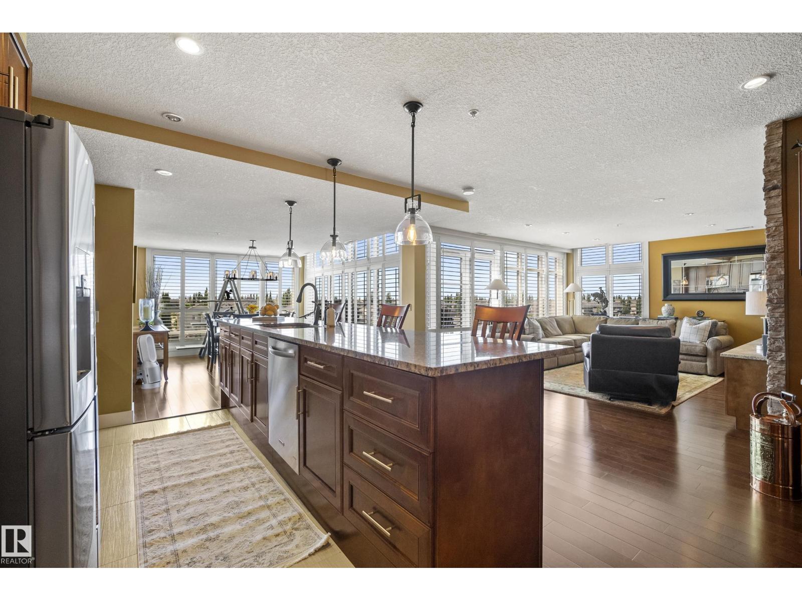MLS® listing #30041853 for sale located at #405 1350 WINDERMERE WY SW