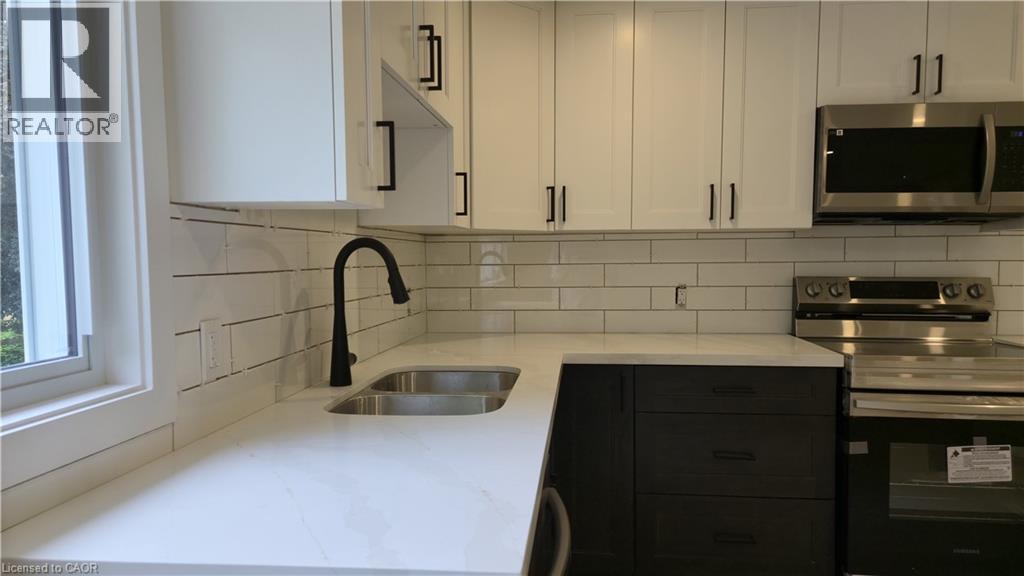 MLS® listing #30060275 for sale located at 404 FOREST HILL Drive Unit# 1