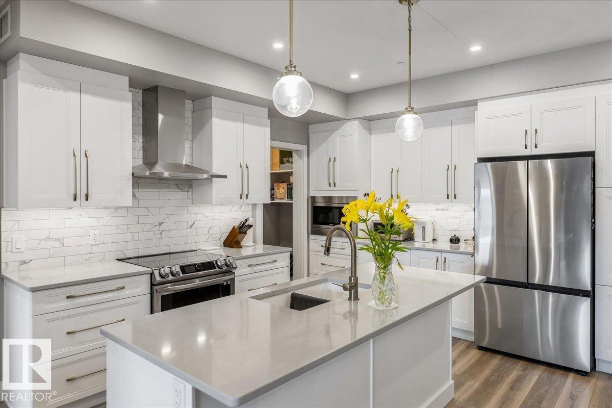 MLS® listing #30082488 for sale located at #428 7463 MAY CM NW
