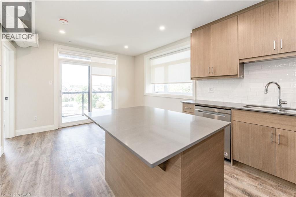 MLS® listing #30099553 for sale located at 72 ERB Street E Unit# 103