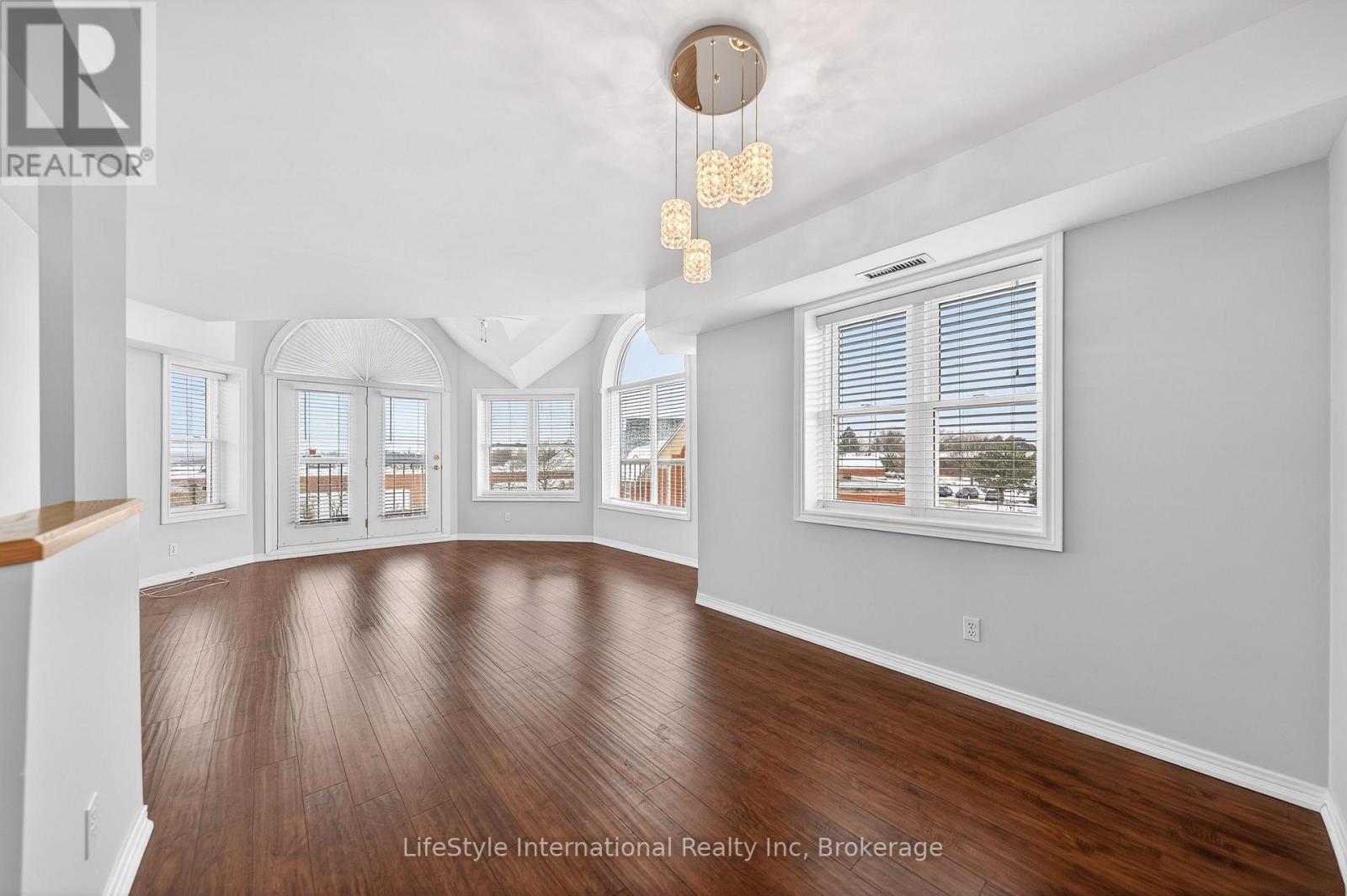 MLS® listing #30103889 for sale located at 306 - 208 SILVERCREEK PARKWAY N