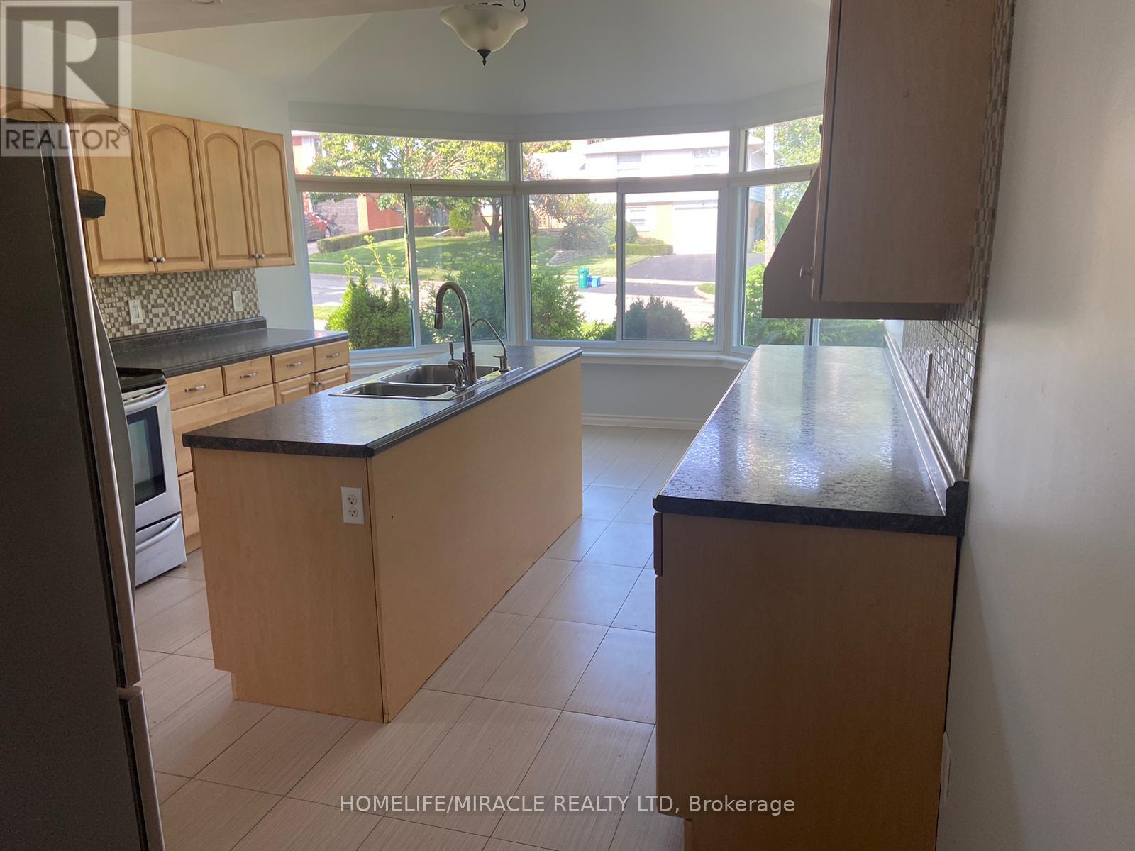 MLS® listing #30117676 for sale located at MAIN FLOOR - 25 THORNRIDGE CRESCENT