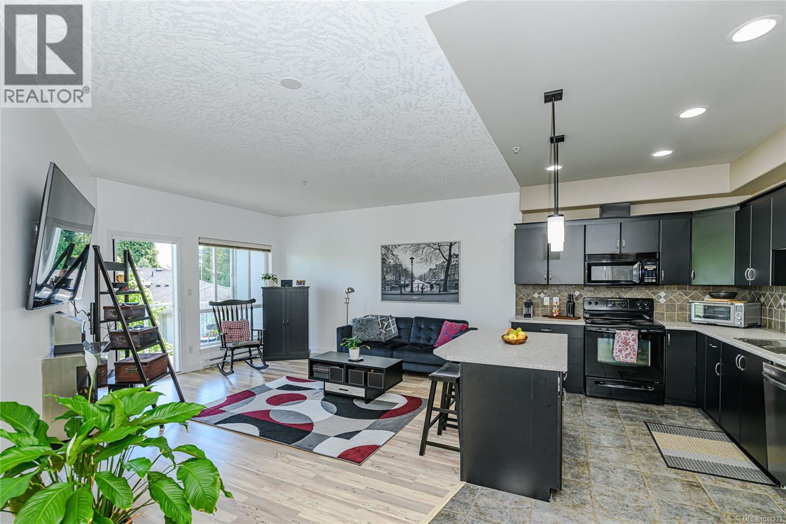 MLS® listing #30121103 for sale located at 205 3915 Carey Rd