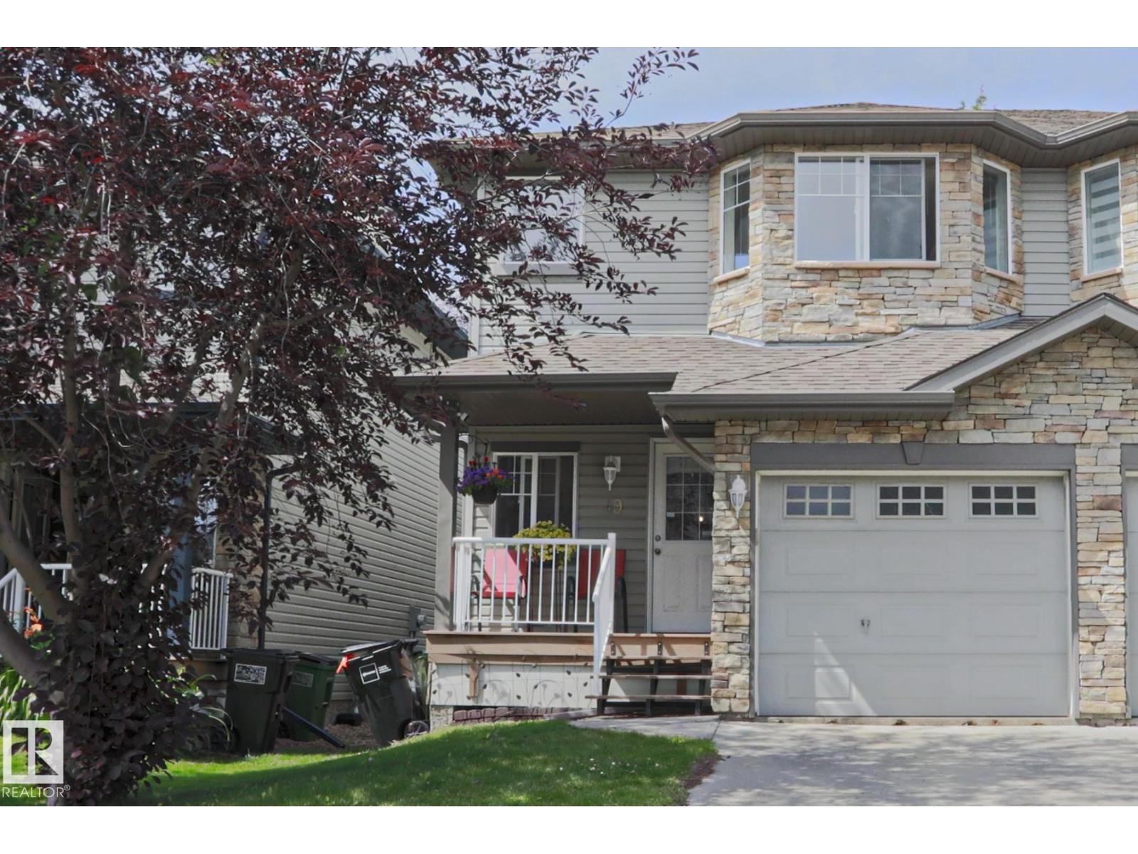 MLS® listing #30124450 for sale located at #49 6304 SANDIN WY NW