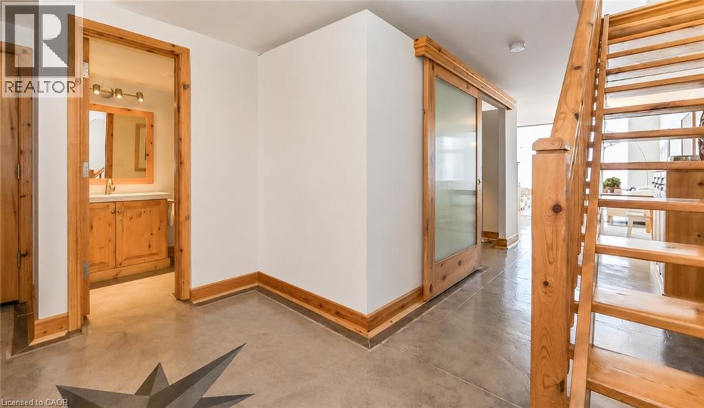 MLS® listing #30156439 for sale located at 5 FATHER DAVID BAUER Drive Unit# 305