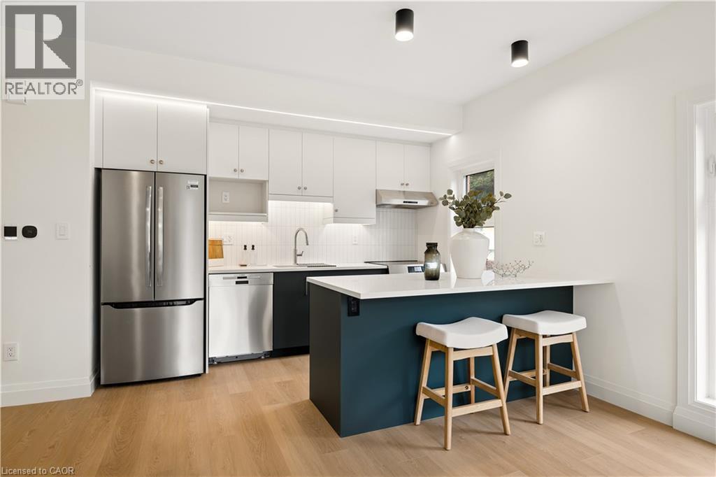 MLS® listing #30159703 for sale located at 563 N WELLINGTON Street Unit# 4