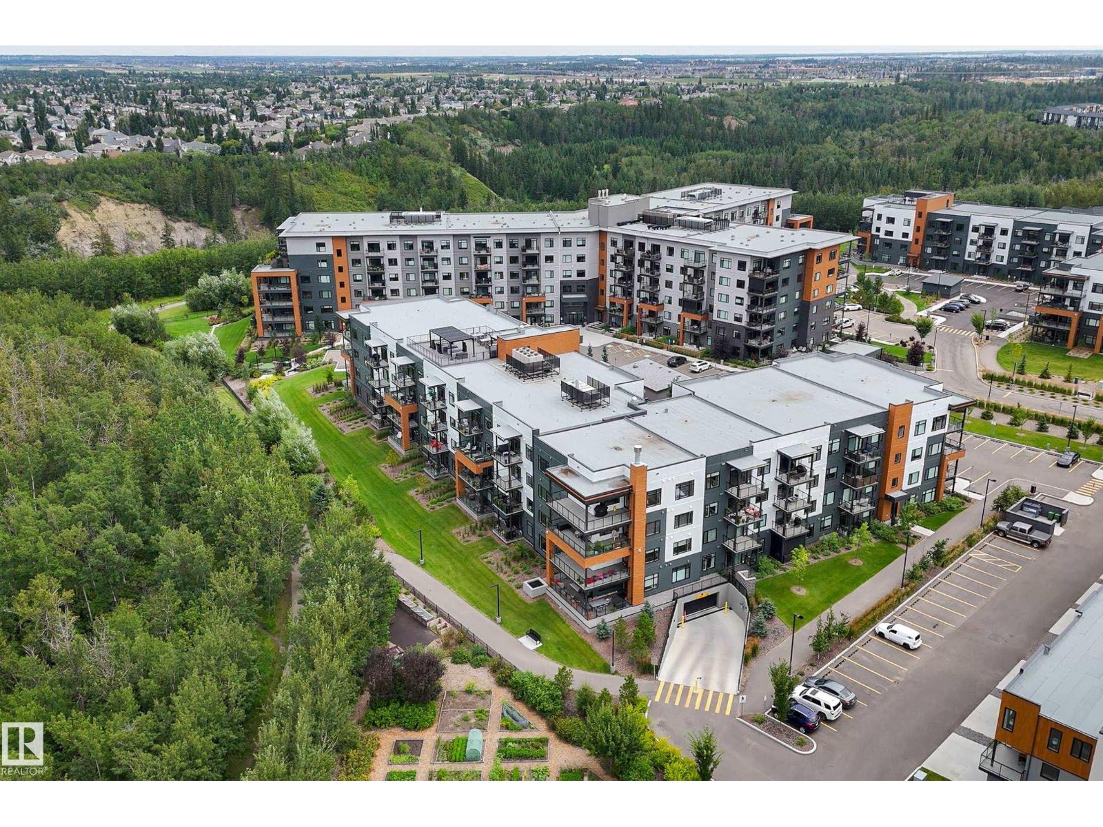 MLS® listing #30181597 for sale located at #312 7471 MAY CM NW