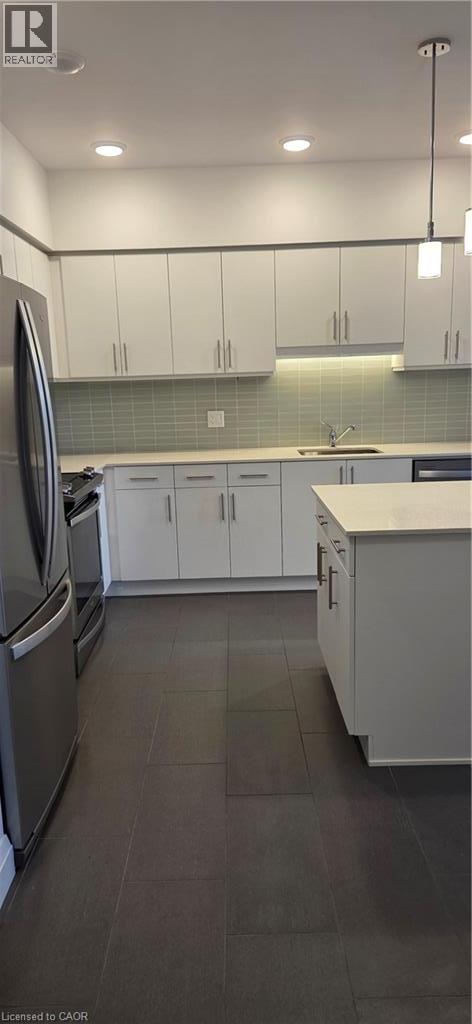 MLS® listing #30245184 for sale located at 399 QUEEN Street S Unit# 304