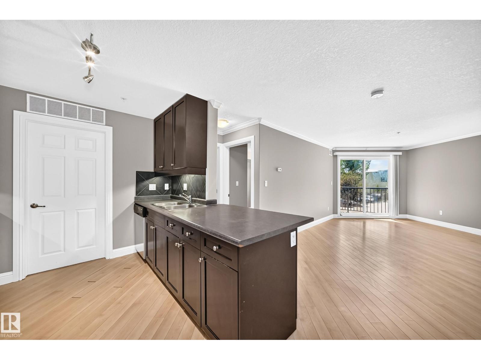 MLS® listing #30322618 for sale located at #202 14608 125 ST NW