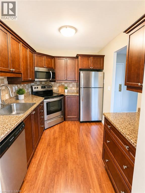 MLS® listing #30360093 for sale located at 18 HOLBORN Court Unit# 212