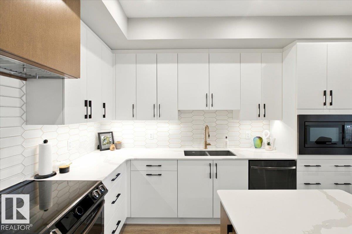 MLS® listing #30363707 for sale located at #427 7463 MAY CM NW
