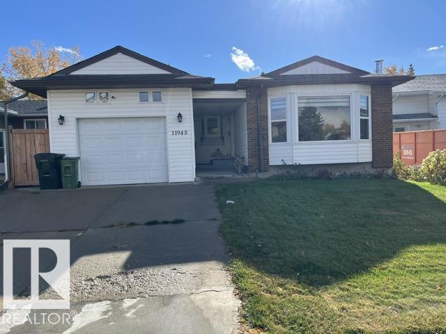 MLS® listing #30378910 for sale located at 11945 138 AV NW