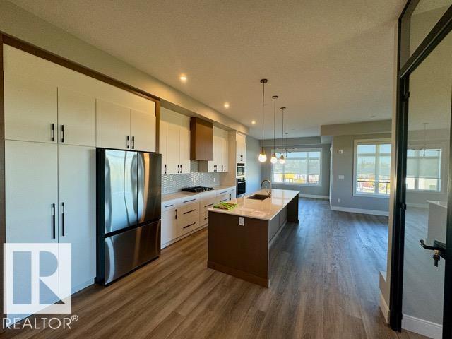 MLS® listing #30430948 for sale located at #410 7471 May CM NW NW