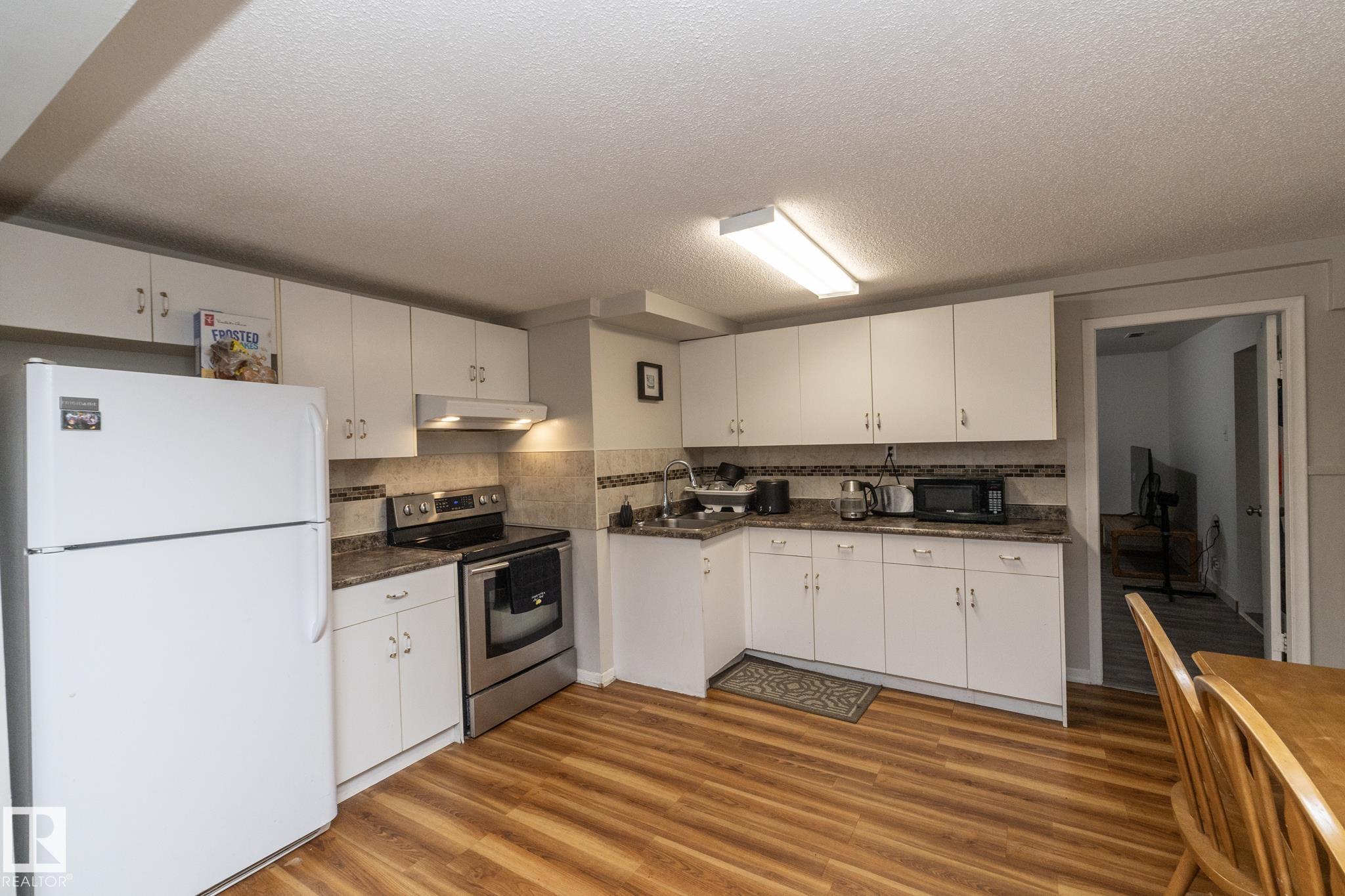 Fifth View of 3418 120 Avenue, Beacon Heights, Edmonton, Alberta, T5W 1K2