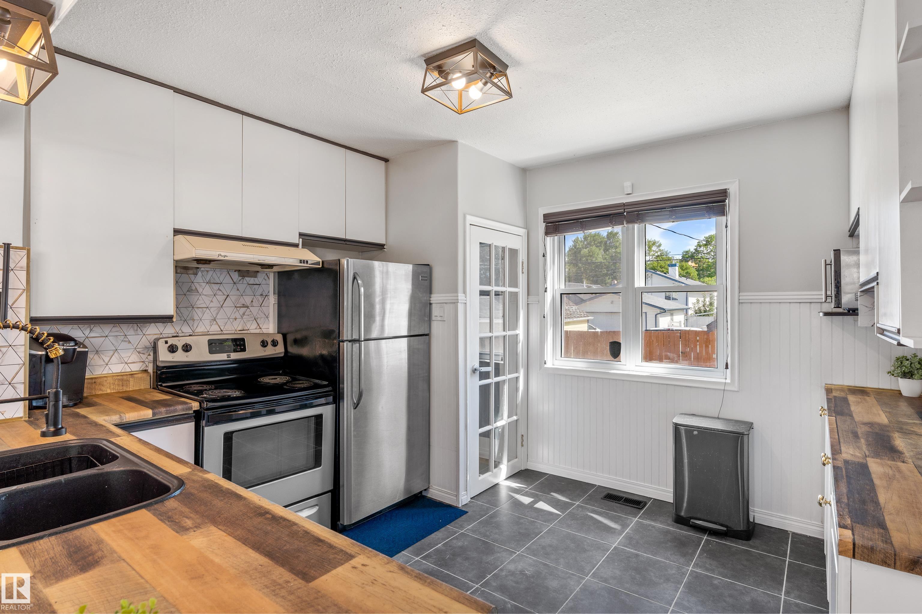 Third View of 11711 94 Street, Alberta Avenue, Edmonton, Alberta, T5G 1J1
