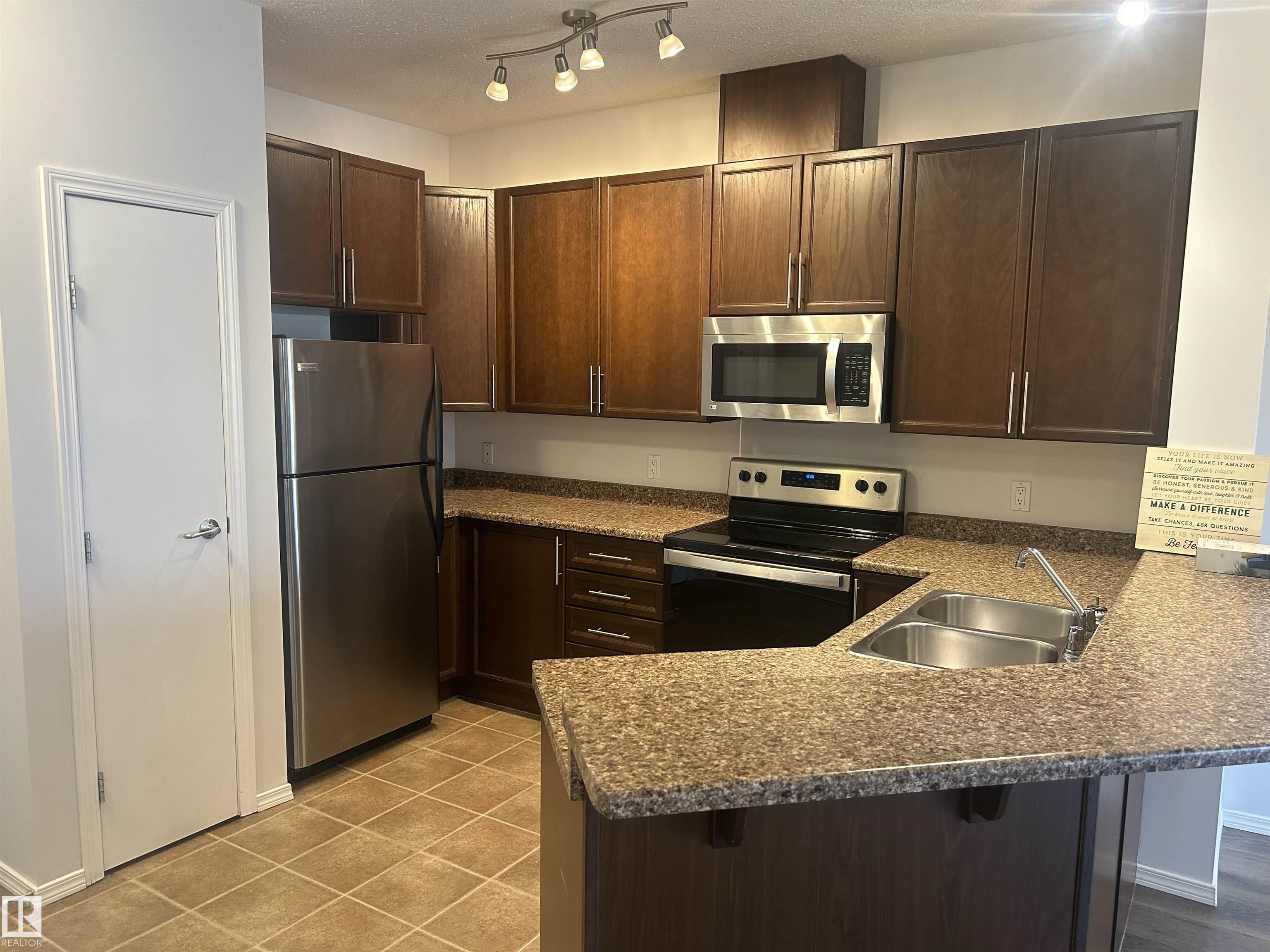 Third View of 411 4316 139 Avenue, Clareview Town Centre, Edmonton, Alberta, T5Y 0L1