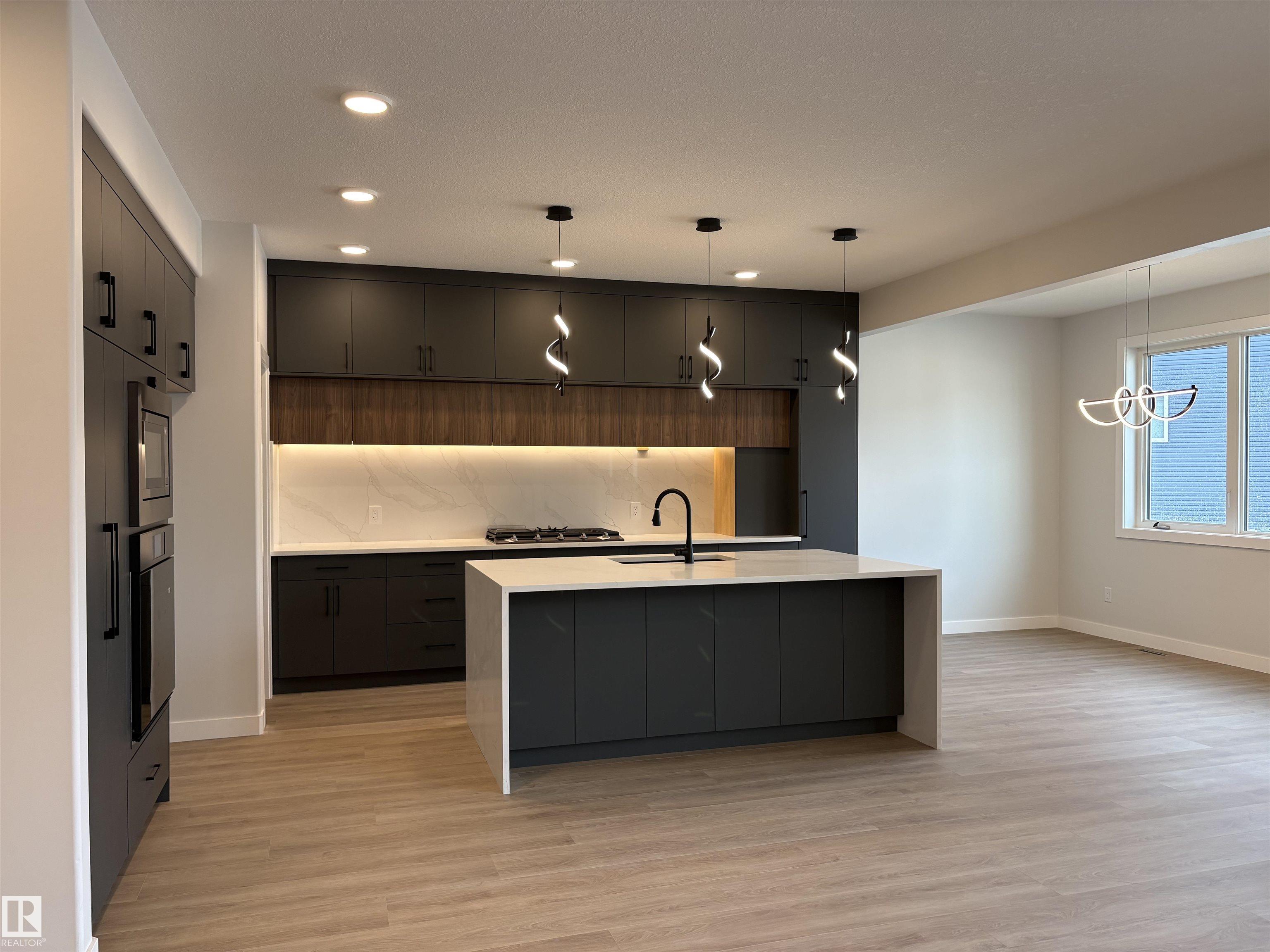 Third View of 1039 151 Ave, Fraser, Edmonton, Alberta, T5Y 4C8