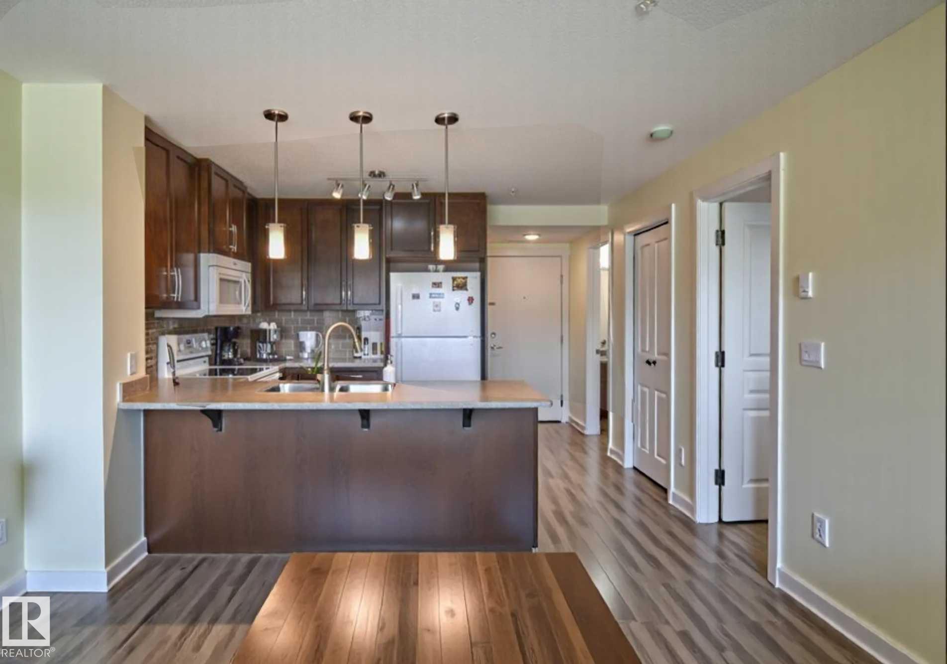 Third View of 210 3670 139 Avenue, Clareview Town Centre, Edmonton, Alberta, T5Y 3N5