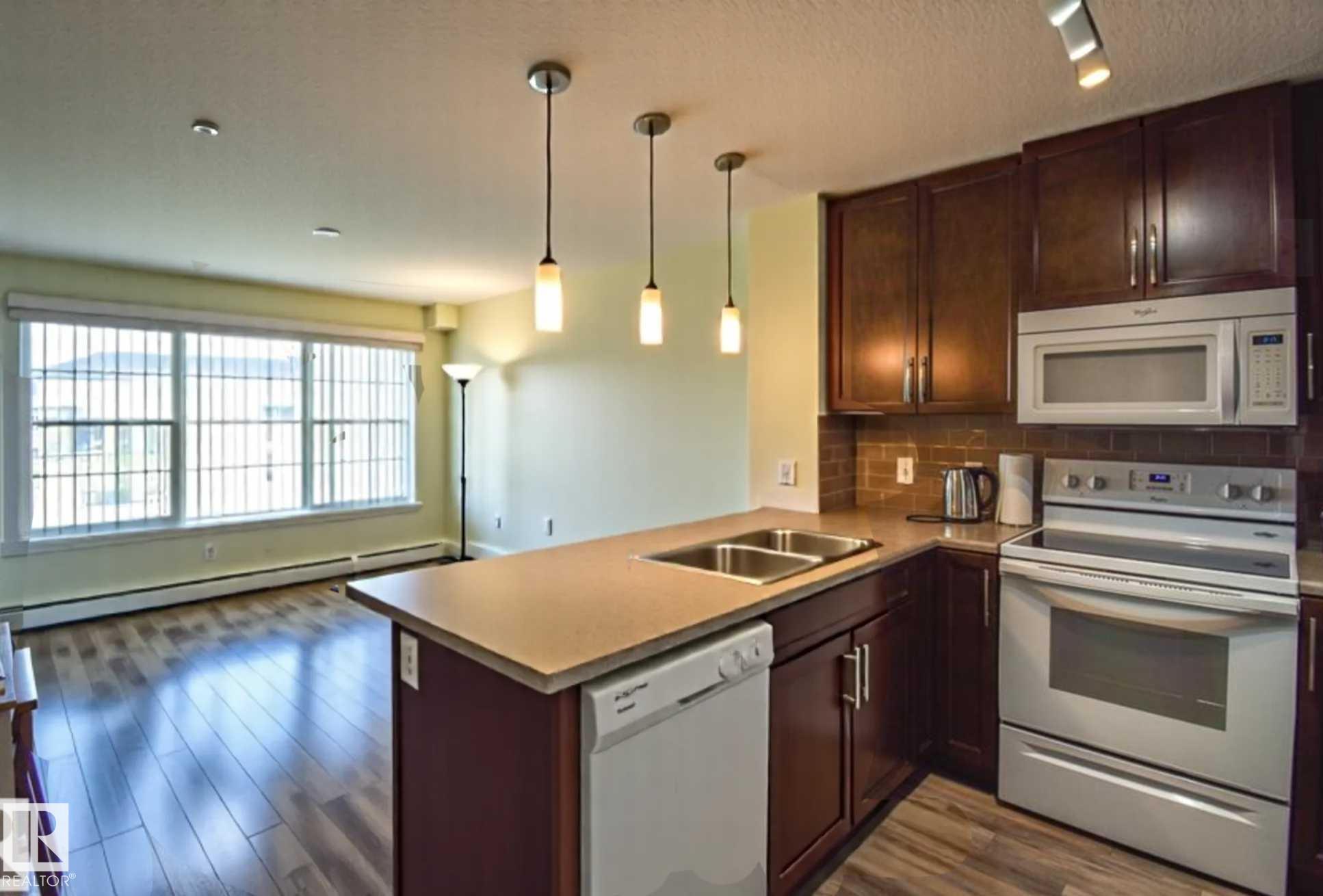 Fourth View of 210 3670 139 Avenue, Clareview Town Centre, Edmonton, Alberta, T5Y 3N5