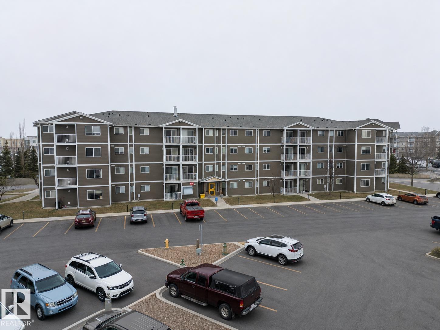205A 260 SPRUCE RIDGE Road, E4508601, Alberta,