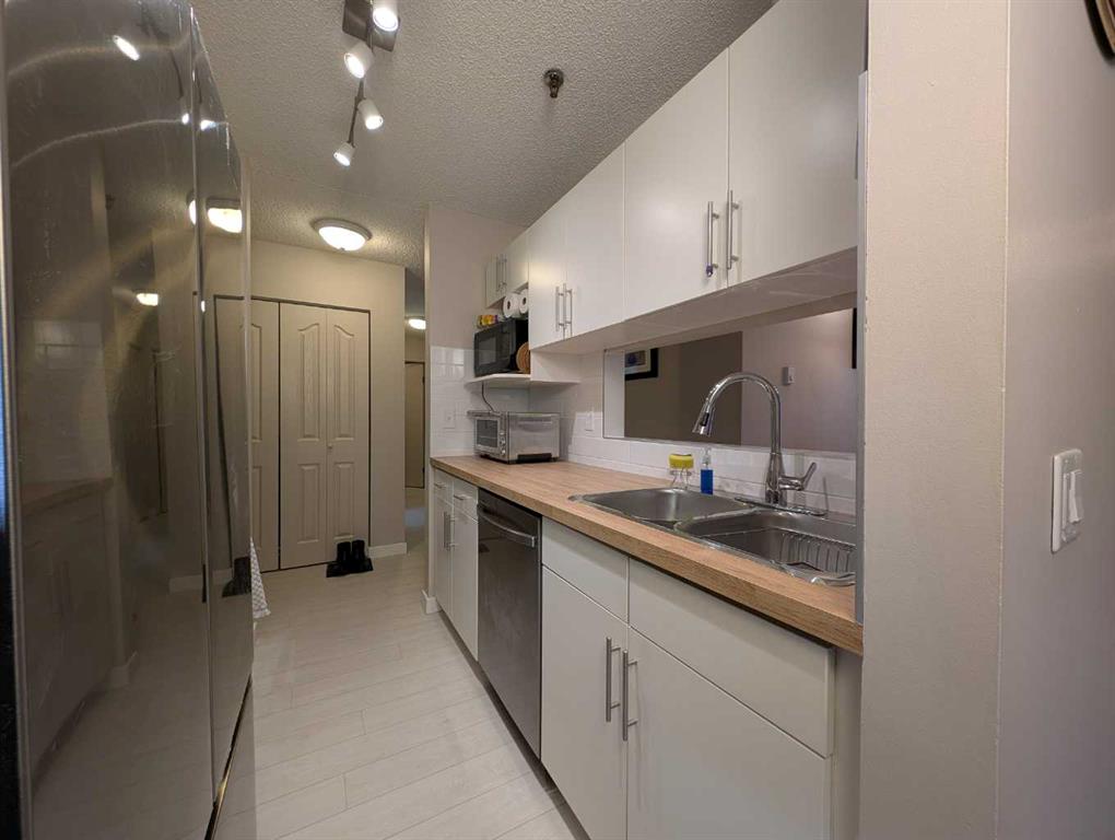 Fourth View of 114, 525 56 Avenue SW, Windsor Park, Calgary, Alberta, T2V 4Z9