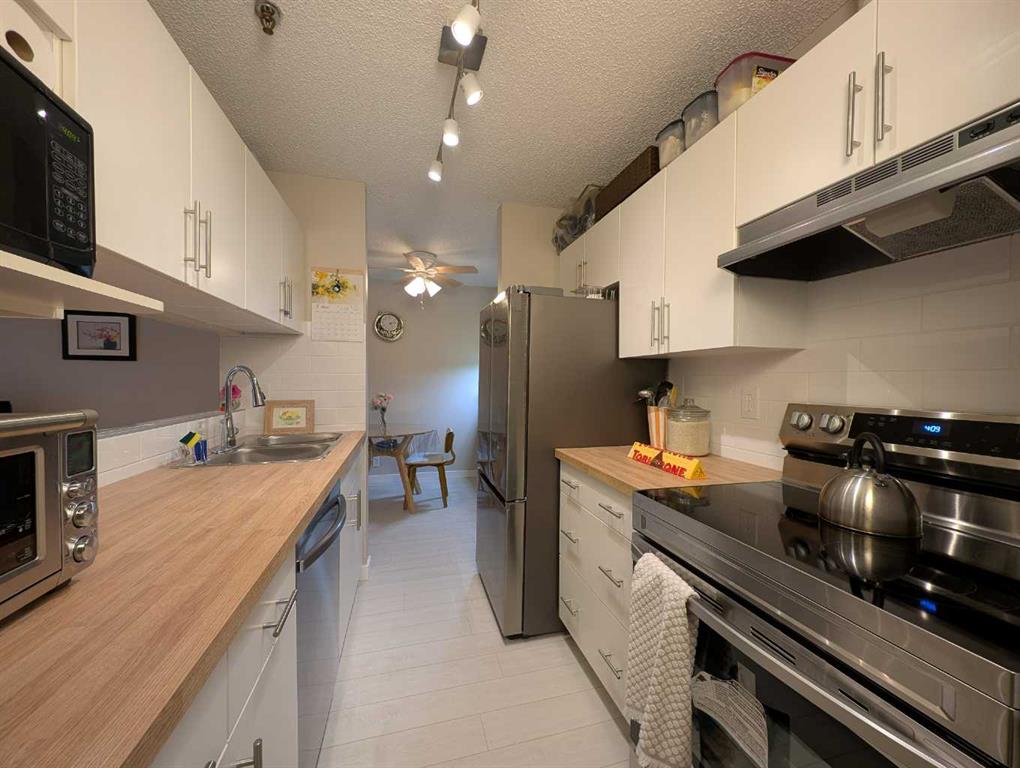 Fifth View of 114, 525 56 Avenue SW, Windsor Park, Calgary, Alberta, T2V 4Z9