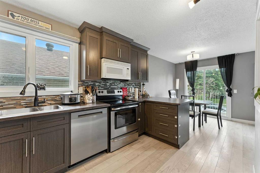 Fourth View of 1, 125 10 Avenue NE, Crescent Heights, Calgary, Alberta, T2E 0W8