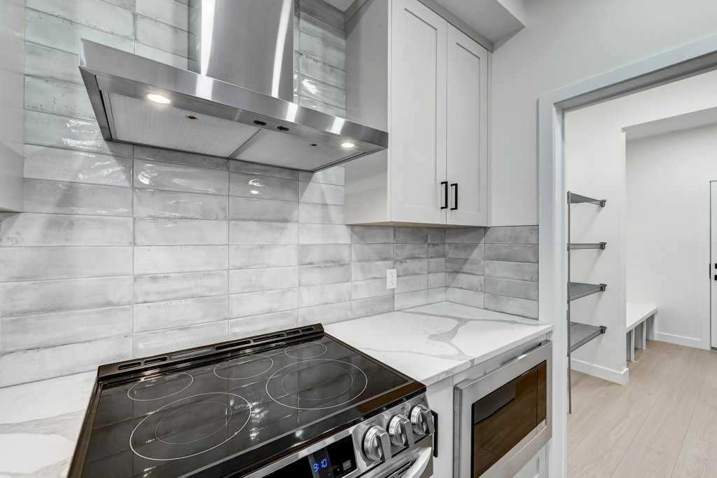 Fourth View of 891 Langholm Drive SE, Lanark, Airdrie, Alberta, T4A 3R2