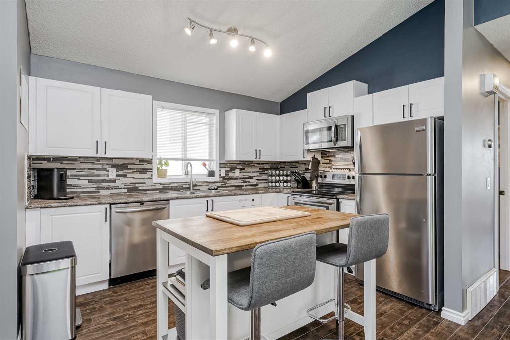 Third View of 14568 Mt Mckenzie Drive SE, McKenzie Lake, Calgary, Alberta, T2Z 3G9