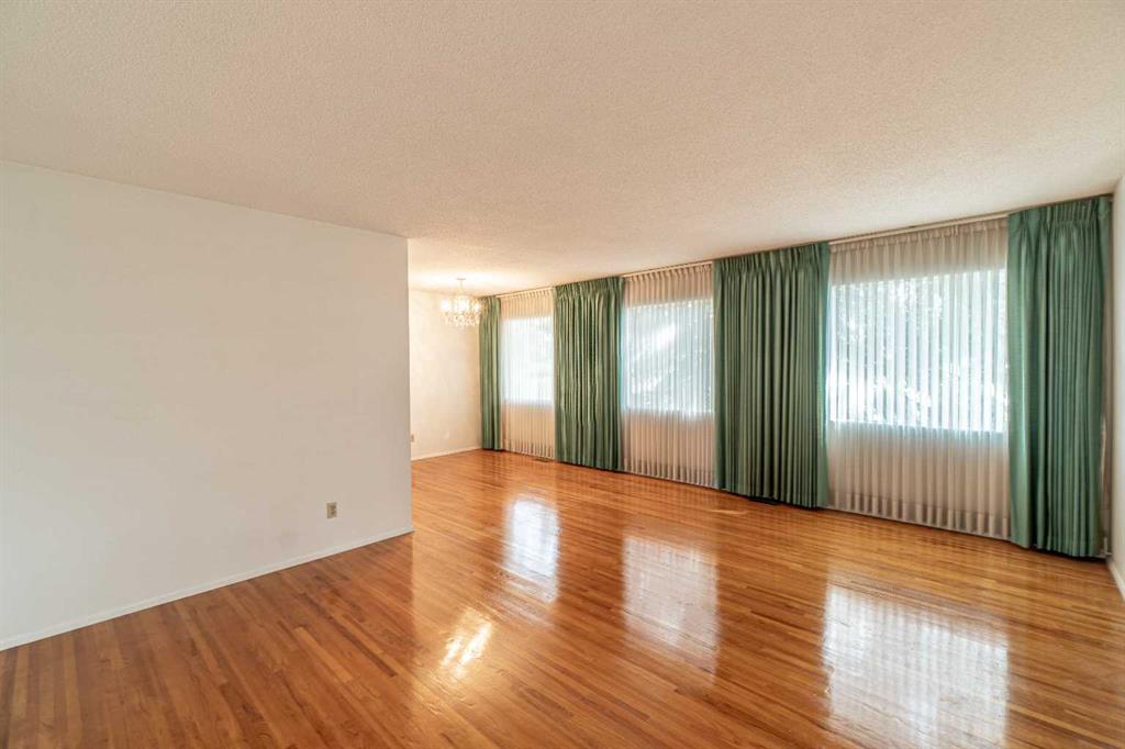 Third View of 1099 Acadia Drive SE, Lake Bonavista, Calgary, Alberta, T2J 0E4