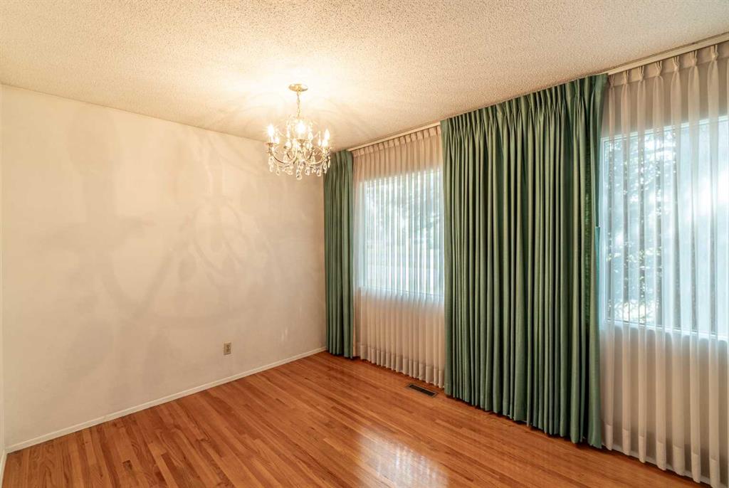 Fifth View of 1099 Acadia Drive SE, Lake Bonavista, Calgary, Alberta, T2J 0E4